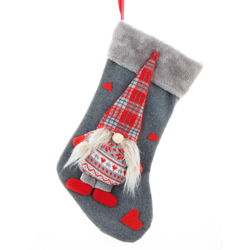Faceless old man big Christmas stocking